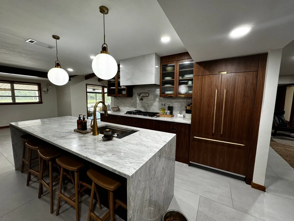 Finished kitchen with custom walnut cabinet doors manufactured by Trinity Doors